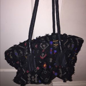 Anthropologie black carpet purse